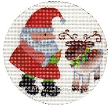 Santa feeding reindeer ornament