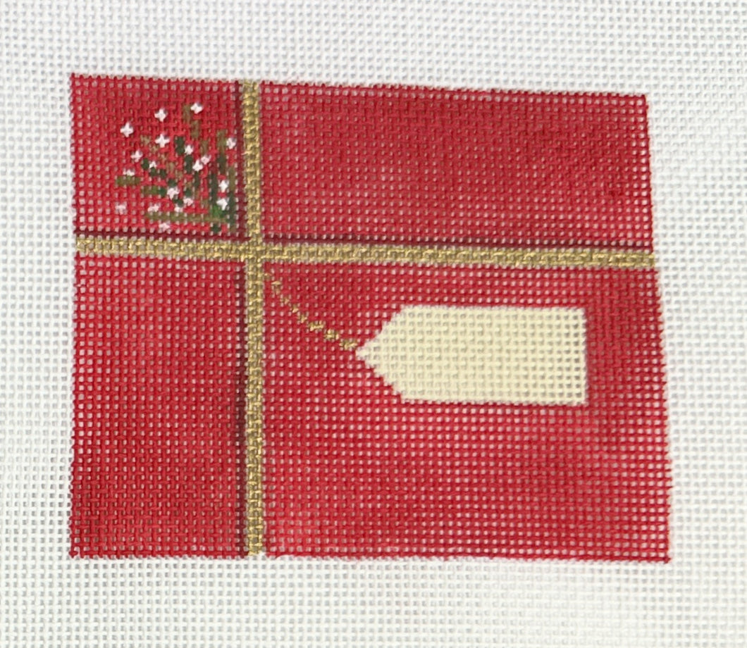red present with tag with stitch guide