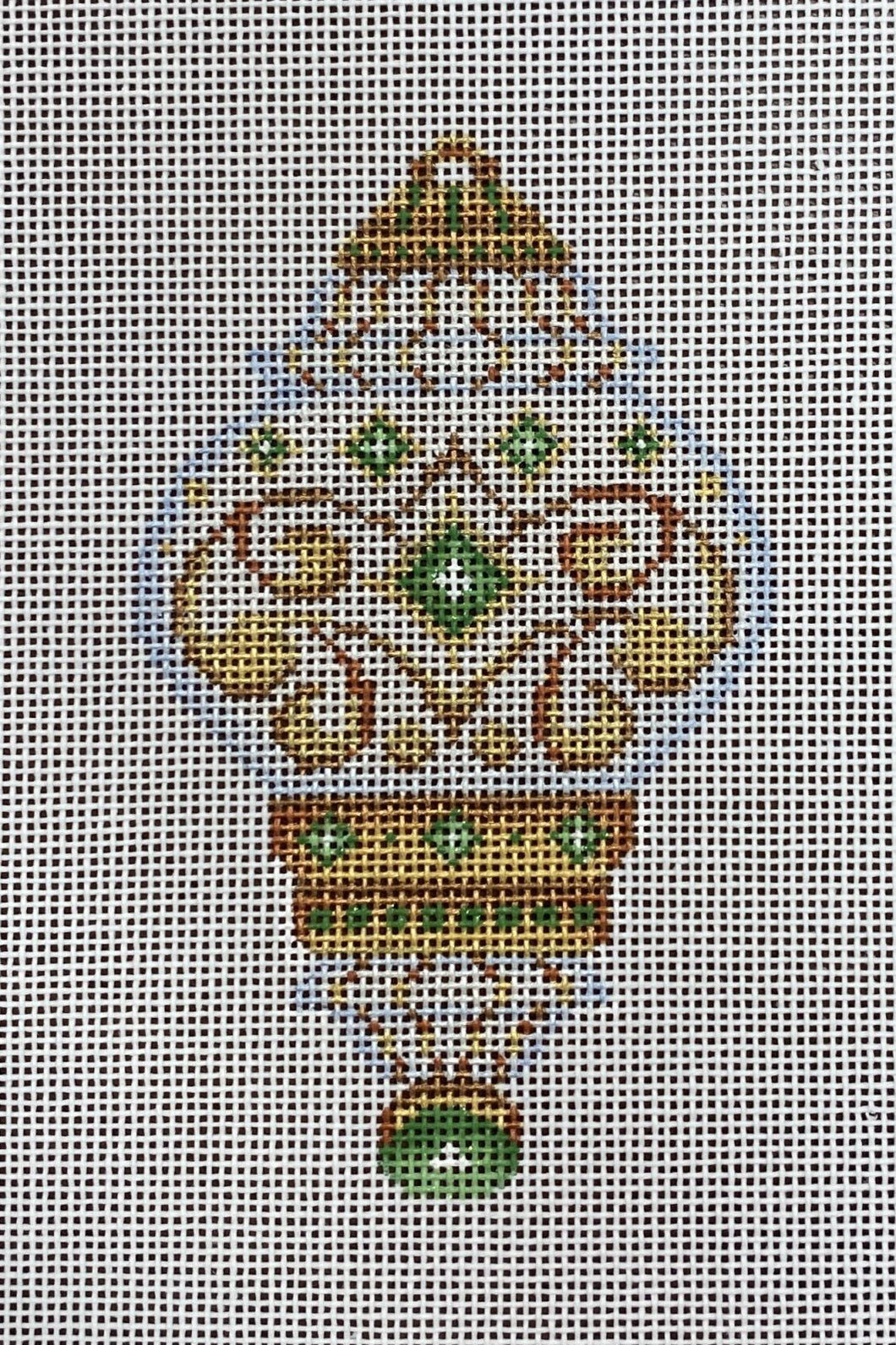 white & gold ornament, peridot jewels