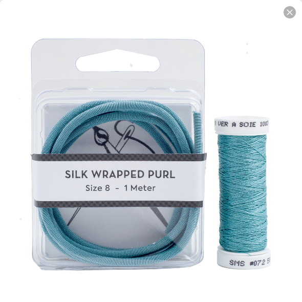 silk wrapped purl/soie