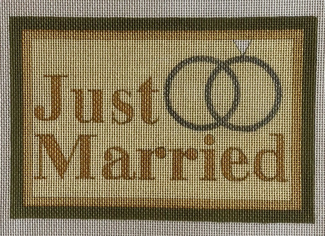 just married with rings