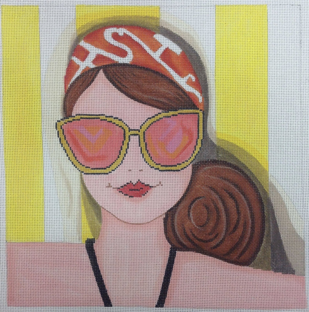 lady in sunglasses on towel